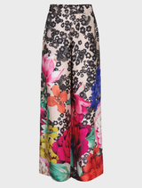Fluid wide-leg trousers in vintage floral design with side splits, elasticated back, and side pockets for comfort and elegance.