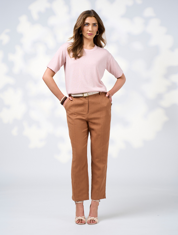 Toffee-colored Quinn pants displayed on a white background, showcasing a sleek and modern design.