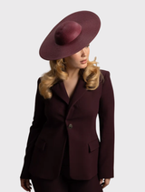Chic burgundy red hat designed for racewear, featuring a structured crown and comfortable fitted headband.