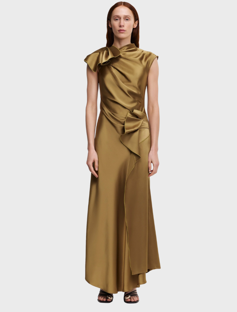 A luxurious gold silk dress featuring a stylish bow at the neck, showcasing elegance and sophistication.