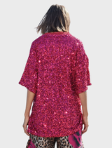 Sparkling raspberry t-shirt featuring sequins, lace trim, and side vents for a comfortable, stylish everyday look.