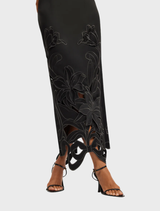 Elegant ebony maxi dress with a fitted appliqué bustier, showcasing a sophisticated and stylish silhouette.