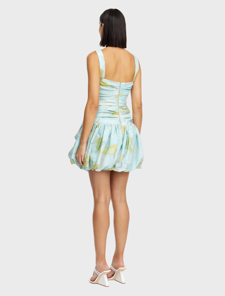 Elegant blue plum mini dress showcasing a forest design, featuring a fitted cut and short sleeves, ideal for casual occasions.