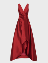 Elegant ruby red gown with a fitted bodice and flowing skirt, perfect for formal occasions or evening events.