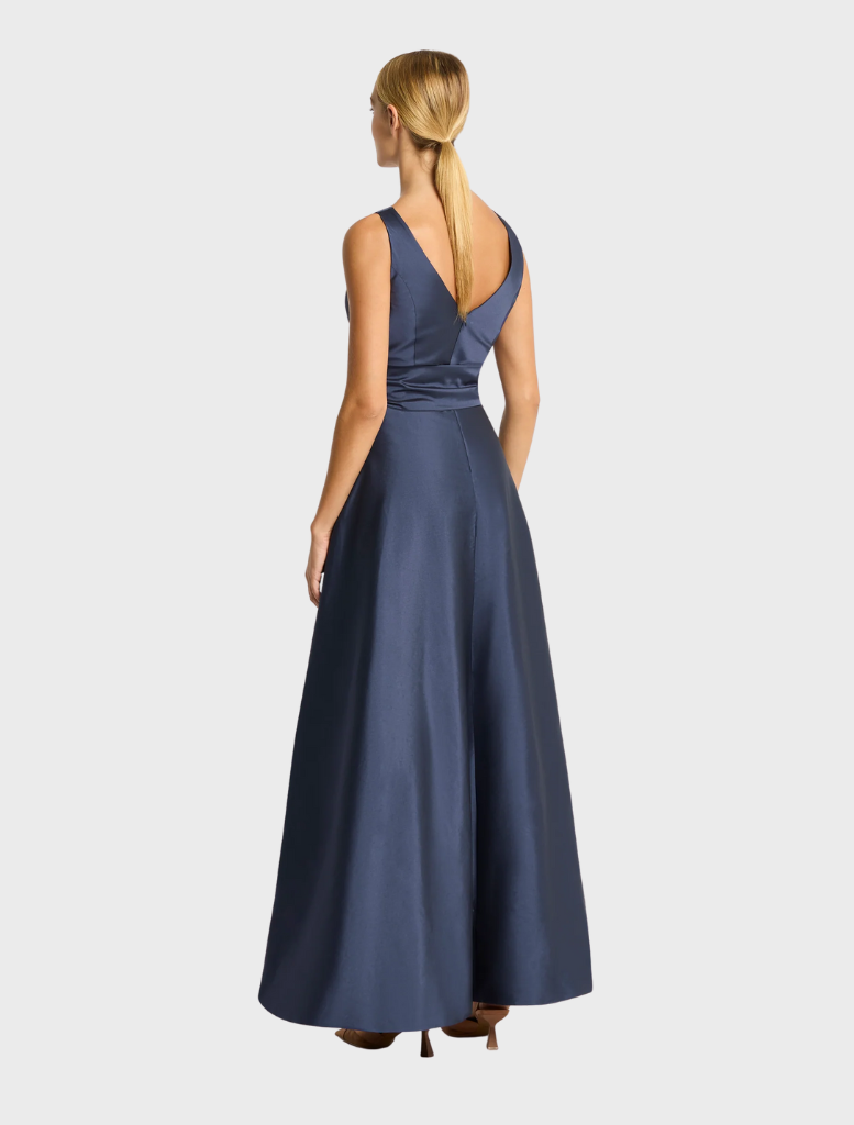 Sophisticated navy gown by Rene, showcasing a tailored fit and elegant lines for a refined look.
