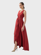 Beautiful ruby red dress with a graceful design, showcasing a fitted top and a full, flowing skirt for elegance.