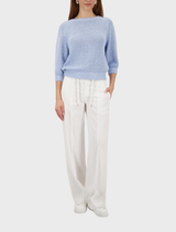 Light sky sweater with a simple ribbon pattern, suitable for everyday outfits.