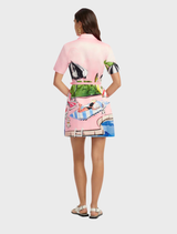 Brigitte Mini Dress with an eye-catching Riviera print, ideal for adding flair to your summer wardrobe.