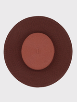 Stylish rose pink boater hat designed for racewear, featuring a structured shape and internal cord for secure and comfortable wear.