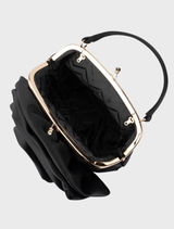 Black Rosita Rosette Frame Bag presented, emphasizing its chic design and functional frame structure.