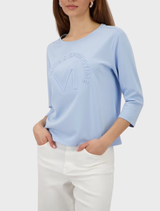 Round neck jersey in light sky color, showcasing a basic emblem.