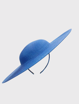 Chic royal blue hat with a structured design and fitted headband, perfect for formal events and race day fashion.