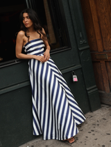 Royal stripe Audrey gown, characterized by its elegant lines and premium fabric, perfect for formal occasions.