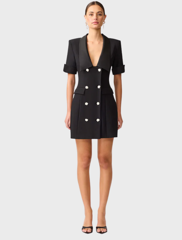 Black blazer dress crafted from a soft wool blend, showcasing a sleek and sophisticated design.
