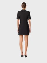  Stylish black blazer dress featuring a wool blend fabric, combining comfort with a chic silhouette.