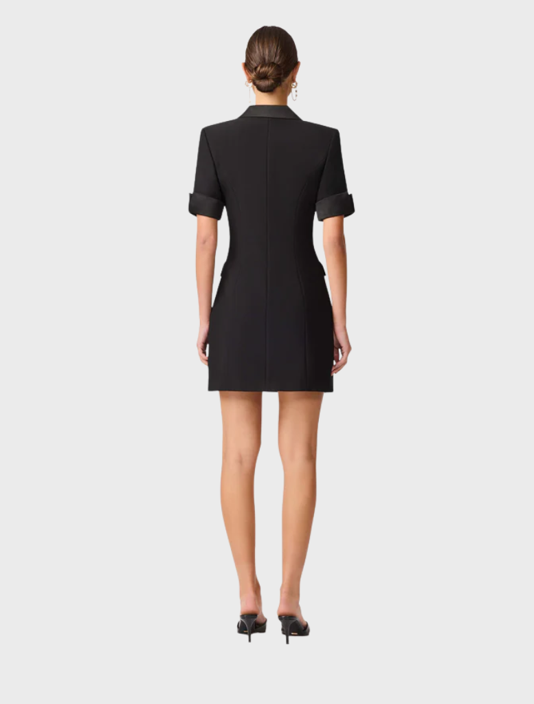  Stylish black blazer dress featuring a wool blend fabric, combining comfort with a chic silhouette.