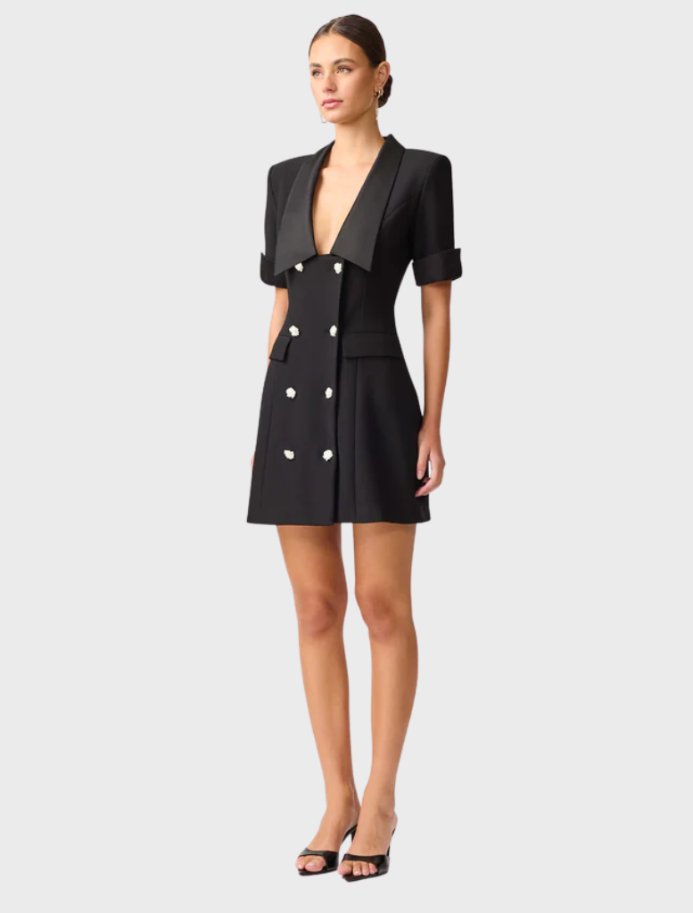  Stylish black blazer dress featuring a wool blend fabric, combining professionalism with modern fashion.