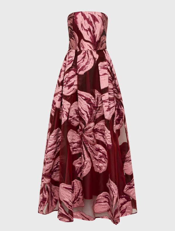 Elegant strapless gown adorned with a colorful floral print, perfect for formal occasions.