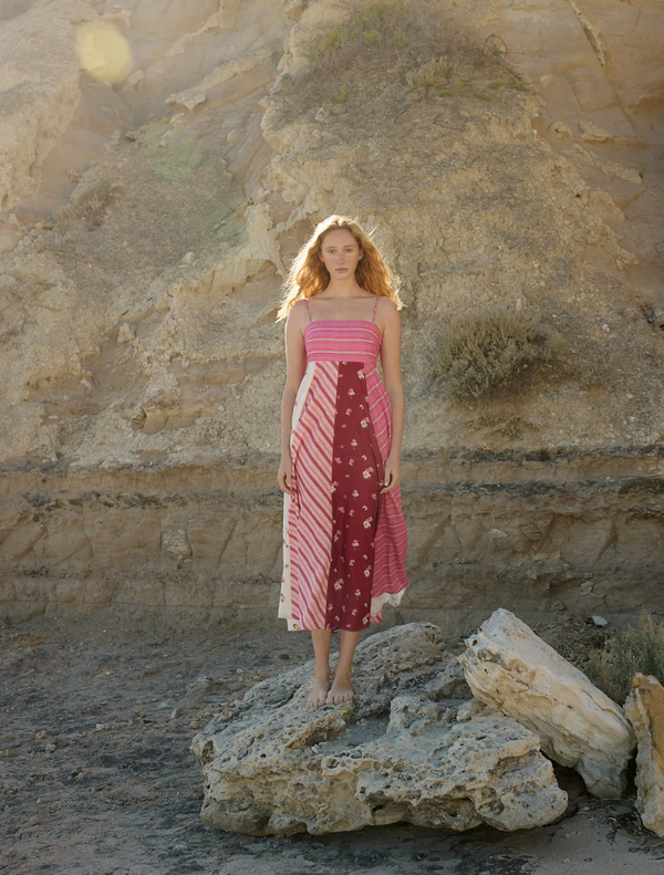 Rue Dress in Redcurrant Multi features a vibrant, multi-colored pattern with a flowing silhouette and elegant design.