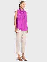 The Rufflet Tank showcases a ruffle collar, gathered shoulders, and a relaxed silhouette in a fine Japanese woven fabric.
