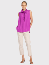 Rufflet Tank by Dahlia features gathered shoulders, ruffle collar, and a relaxed fit in a smooth, non-stretch fabric.