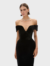 Black Ryn gown hanging on a hanger, featuring a sleek silhouette and delicate detailing.