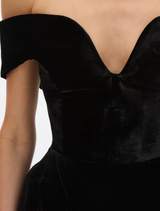 Black Ryn gown showcased on a model, illustrating its chic style and graceful fit.