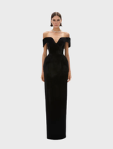  Elegant black Ryn gown displayed on a mannequin, showcasing its flowing fabric and sophisticated design.