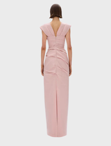 The Salma gown, presented in a gentle rosewater shade, features a refined silhouette ideal for evening wear.