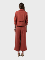 Navi Pants in Sandalwood, made of linen blend with elastic waist, forward seams, and frayed pocket edges for added texture.