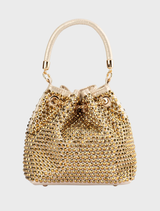 Stylish gold pouch with a studded hotfix pattern, offering a trendy solution for carrying personal belongings.