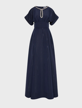 Elegant navy sapphire gown with a flowing silhouette and intricate detailing, perfect for formal occasions.