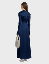 The Ramwark Maxi Dress in Sapphire, designed with a sculpted silhouette and satin finish, perfect for modern evening celebrations.