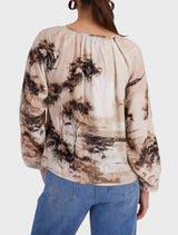 All-over sand pattern blouse, combining comfort and style for a versatile addition to any wardrobe.