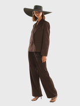 Black Savannah boater hat with a classic shape and wide brim, perfect for special occasions. One size, comfortable and chic.
