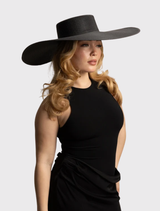 Wide-brim black boater hat with structured crown, ideal for racewear and events, featuring a 57cm circumference and 18cm brim.