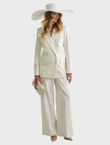 Classic white boater hat featuring a large 18cm brim and structured crown, perfect for Ladies Day and weddings.
