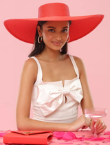 Elegant red boater hat with an 18cm brim and 57cm crown circumference, suitable for Ladies Day and weddings, ensuring comfort.