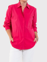 Raspberry Saville Shirt featuring a crisp collar, longline silhouette, and concealed placket, crafted from lightweight microprene.