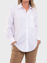 White Saville shirt displayed on a hanger, featuring a classic collar and button-down front.