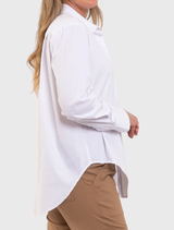 Lightweight white Saville Shirt featuring an oversized fit, concealed front placket, and a stylish longline silhouette.