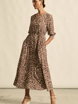 Stylish leopard print midi dress featuring soft, lightweight fabric, perfect for any occasion.