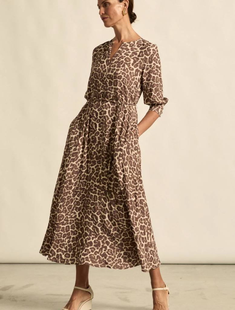 Stylish leopard print midi dress featuring soft, lightweight fabric, perfect for any occasion.