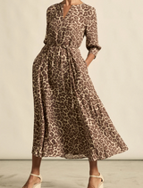 Soft, lightweight leopard print midi dress, ideal for a chic and comfortable outfit choice.