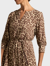 Elegant leopard print midi dress crafted from soft, lightweight material for a comfortable fit.