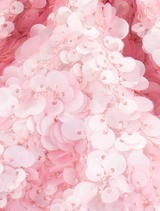 Pink Mattie Sequin Pouch with a decorative chain a fashionable accessory for various occasions.