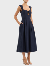 Navy Serenity Midi Dress showcasing a classic design with a comfortable fit, suitable for various occasions.
