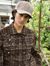 Chocolate check shacket with a relaxed fit, featuring button closures and a stylish collar for a casual look.