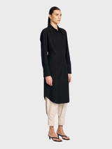Black shirt dress with a structured shape, featuring a button-up front and short sleeves for a chic appearance.
