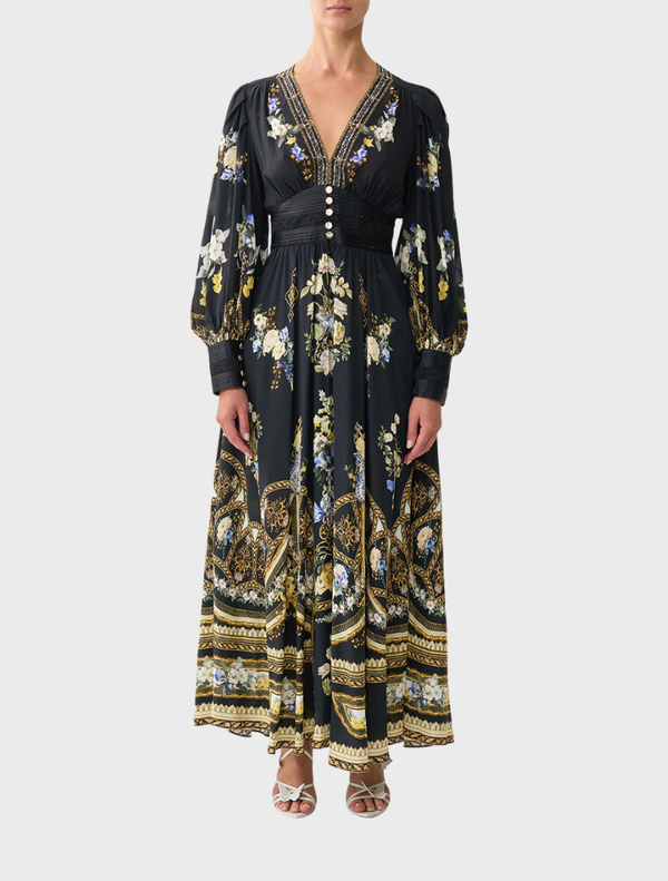 Elegant dress with a shaped waistband and gathered sleeves, showcasing Ottoman-inspired design elements.
